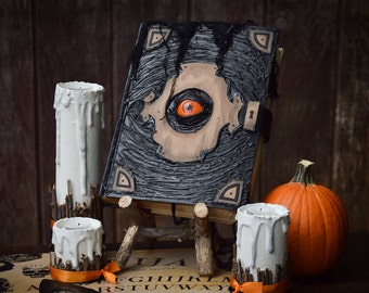 Book of the Damned • Halloween Decor • Spell Book & Wood Stand • Witch Halloween Decoration • Black Spellbook • Orange Eye • Leather Strap