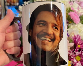 Pedro Pascal Mug (The Unbearable Weight Of Massive Talent, Nic Cage on one side, Pedro Pascal on the other side of the mug)