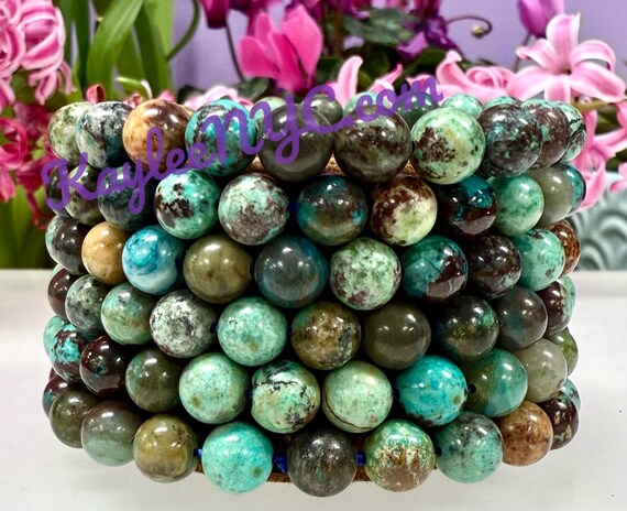 thumbnail interactive-video image 1 of Wholesale Lot 6x Natural Turquoise 8mm Stretch Bracelets – 7.5" Crystal Healing (Blue) 1 of 5