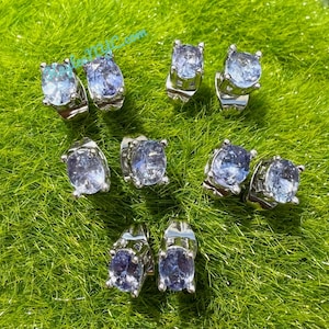 Groothandel: 5 paar natuurlijke tanzaniet sterlingzilver(925) oorstekers 4 x 5 mm