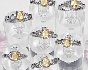 Lote al por mayor de 7 anillos de acero inoxidable con citrino de 5 x 7 mm