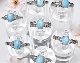 Lote al por mayor de 7 anillos de acero inoxidable (316) de larimar natural de 7 x 9 mm