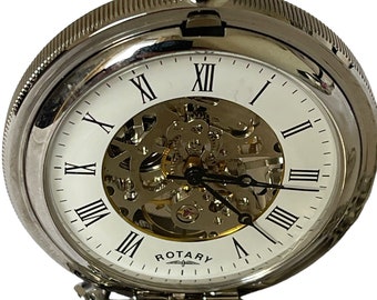 May include: A silver pocket watch with a white face and Roman numeral hour markers. The watch has a skeletonised movement, allowing the inner workings to be seen. The watch is open and the back of the watch is visible. The back of the watch has a circular pattern.