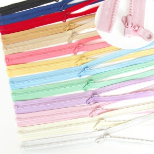 Puede incluir: Surtido de 16 colores de cinta de cremallera, cada uno con dos deslizadores de cremallera. Los colores incluyen negro, azul marino, rojo, beige, rosa, amarillo, azul claro, verde, lavanda, rosa claro, crema y blanco.