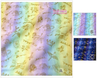 May include: A rainbow ombre fabric with a gold print of various symbols, including a crown, a cross, a scorpion, a lion, and a winged horse. The fabric is labeled "SOUHE FABRICS".