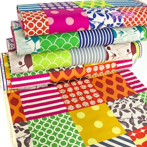 May include: A pile of patterned fabric rolls featuring a patchwork design. The fabrics display a variety of patterns, including polka dots, stripes, and floral motifs, in vibrant colours such as pink, green, orange, and blue. Ideal for crafting.
