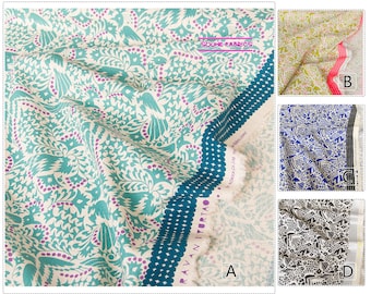 May include: A collection of patterned fabrics. The main fabric (A) features a teal and purple bird and floral design on an off-white background. The border is teal with white dots. The other fabrics (B, C, D) have different patterns and colors.