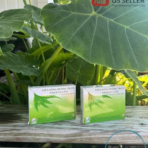 May include: Two boxes of Vietnamese herbal supplements, each with a green background and the text "VIÊN XÔNG HƯƠNG TRÀM VIM BÁO GẦM" in black. The boxes are labeled "20 VIÊN NANG MỀM".