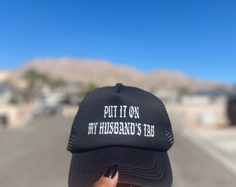 Put it on my husband’s tab trucker hat