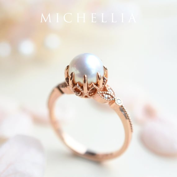 Anillo de compromiso online con perla significado