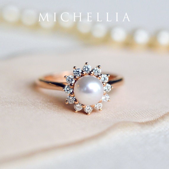 Pearl halo engagement on sale rings