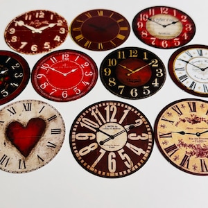 May include: A collection of vintage-style clock faces in various shades of red, brown, and cream. Each clock face features Roman numerals and classic clock hands. Some include text such as "Paris" and "Boston".