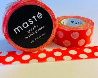 May include: Two rolls of red washi tape with white polka dots. The tape is labeled "masté washi masking tape MARK'S Inc."