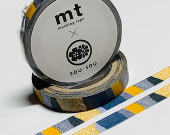 May include: Two rolls of decorative masking tape with a plaid pattern in navy blue, yellow, and white. The tape rolls are labeled "mt masking tape" and "SOU・SOU". Two strips of tape are unrolled, showing the pattern.