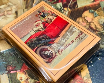 May include: A stack of Christmas cards featuring a vintage illustration of Santa Claus in a red car with a Christmas tree. The cards have a beige border and the words "Send Christmas wishes" are printed on the front.
