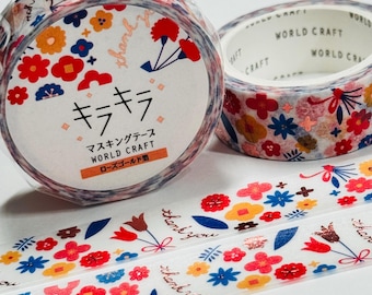 May include: Two rolls of decorative masking tape featuring a floral pattern with red, yellow, and blue flowers, green leaves, and the text "thank you" in rose gold foil. The label on the roll includes the Japanese text "キラキラ" and "マスキングテープ".