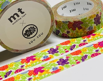 May include: A roll of washi tape with a floral pattern in shades of pink, yellow, green, and purple. The tape is labeled "mt masking tape" and "SOU SOU".
