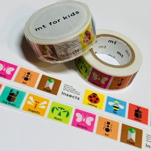 May include: Two rolls of colorful washi tape featuring different insects. The tape is labeled "mt for kids" and "Insects".