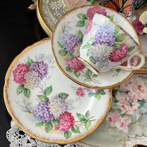 Vintage Royal Stafford bone china England in Carousel pattern Tea cup and cake plate