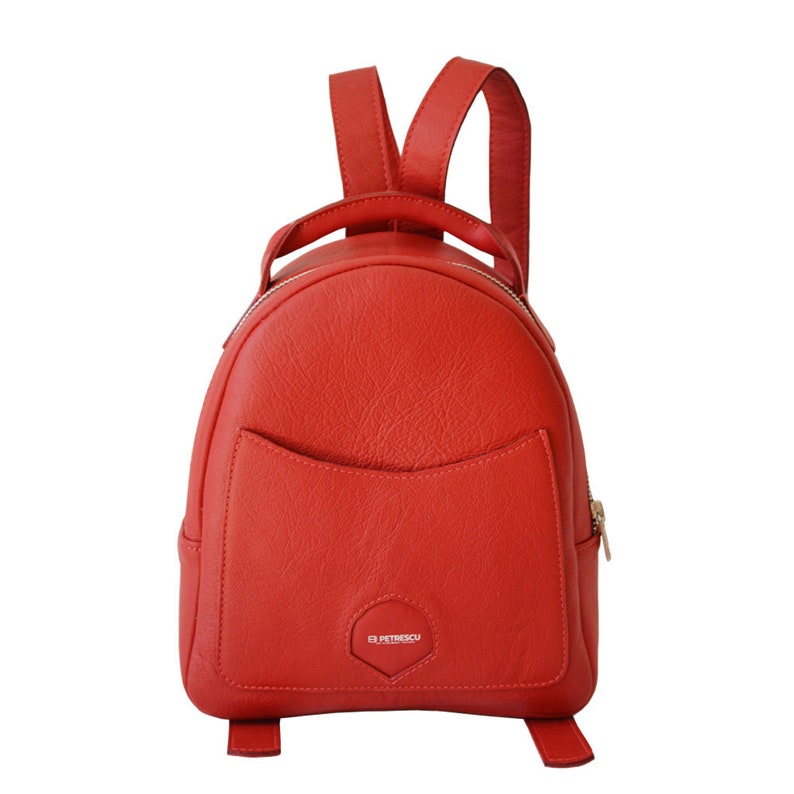 small red leather backpack