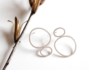 Asymmetrical silver stud earrings • Delicate sterling silver mismatched studs • Dainty textured hoop earrings