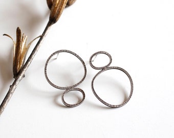 Mismatched oxidized silver stud earrings • Dainty asymmetrical post earrings • Minimal delicate hoop earrings