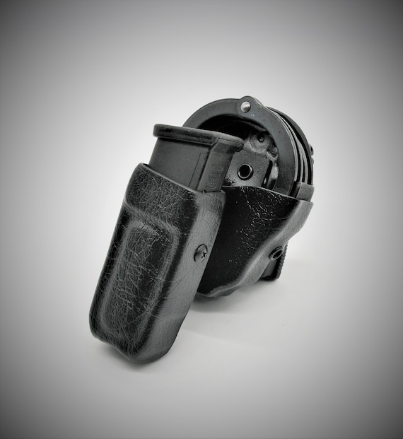 Handcuff, magazine combo, sleek and trim-Suit gear for Plain clothes carry, undercover officer gear