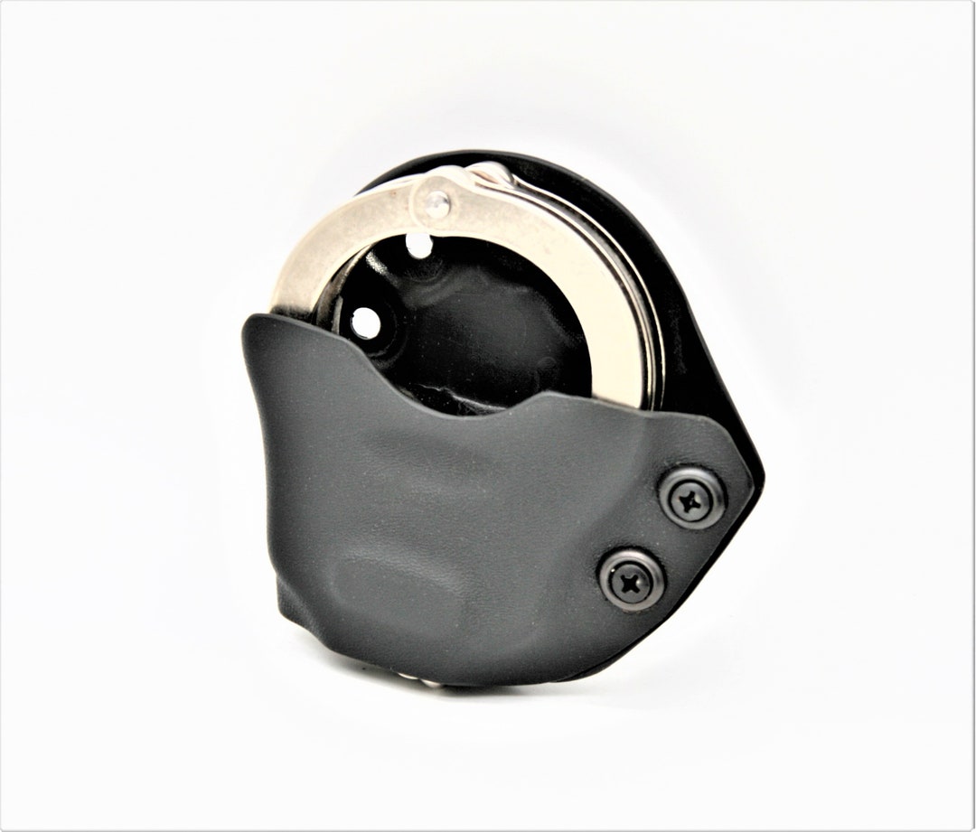 Taco style, side tension Handcuffs. Universal Handcuff Holster