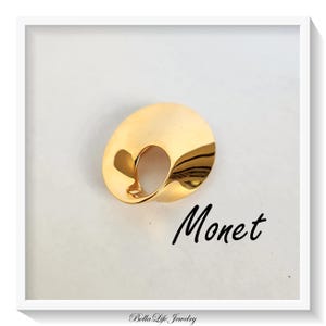 Glänzende Gold Monet Brosche, abstraktes Oval mit Lochdesign