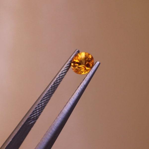 Pretty Orange Spessartite Garnet Round loose Gemstone 0.72 carats  5.5mm