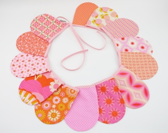 Pennant banner/fabric garland in orange/pink/rose tones