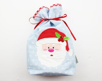Weihnachtssäckchen/Geschenkverpackung Sterne hellblau/rot