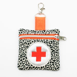 Mini borsa di pronto soccorso 8 x 8 cm stampa leopardata beige/arancione neon
