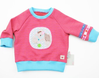 Sweater organic jacquard size 62-128 horse pink/turquoise