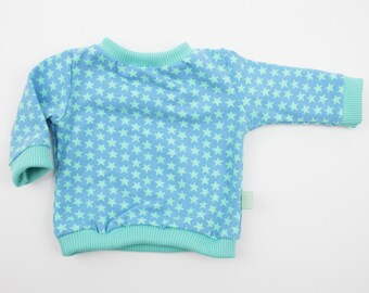 Doll sweater size 43-46 cm stars light turquoise/mint