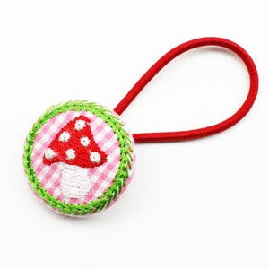 Haargummi 30 mm Fliegenpilz gestickt rosa/rot
