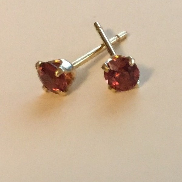 Special 3MM Ruby Studs Nice Red Ruby Color, 14 karat gold settings, buy a pair or a single stud. Great Bridal Gifts or for everyday wear