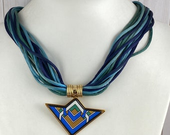 Vintage Michaela Frey Willie Pendant Chevron Shaped with a Enameled Interlocking Blue, Gold, Green and White Design Necklace Art Deco 1990's