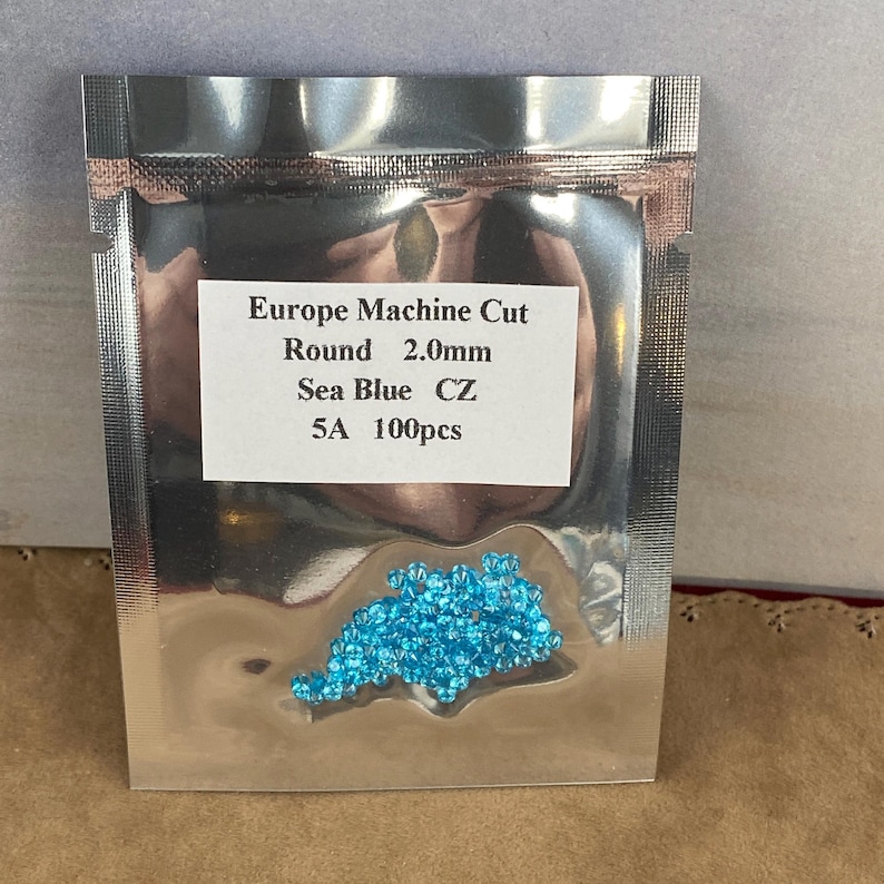 2MM Perfect Color and Quality Faceted Sea Blue Round CZ Machine Cut Loose Cubic Zirconia