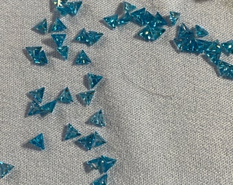 3x3MM Perfect Color and Quality Sea Blue Triangle Machine Cut Loose CZ Cubic Zirconia Gemstone Sold in packages of 4 pieces