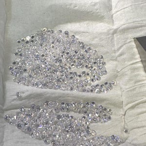 Cubic Zirconia CZ Gemstones: White Bright, Round Cut, from Size 0.8-5mm, 24 Piece Packages.