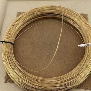 14K Yellow Gold Filled Round Wire 24 Gauge Wire Gold Filled Round Wire Soft 14/20GF 0.020th for beading and enameling sold in 60 inch lengths 
24 Gauge Wire 14K Yellow Gold Filled Round Wire sold in 5 foot length.
Soft great for pearl necklace and bracelet strands, beading, tying pig tails, fishing lures, enameling, etc…. 14/20GF 0.020 thousandths wire is semi finished just run through a jewelers cloth to polish.  5 feet weight is 2.85 grams.
for repairs, jump rings (just use a 10 Penny nail).