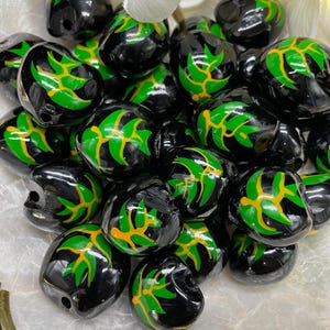 LOOSE Kukui Nuts Hawaiian Kukui Nuts Loose for Lei Making and Kukui Nut Crafts Beads Hawaiian Black Kukui GREEN HELICONIA Flower 10 pcs