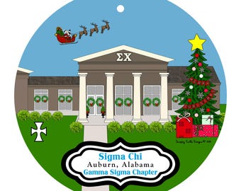 May include: A round Christmas ornament featuring a building with columns, wreaths, and a Christmas tree. Santa Claus in a sleigh is in the sky. The ornament has text that reads "Sigma Chi Auburn, Alabama Gamma Sigma Chapter."