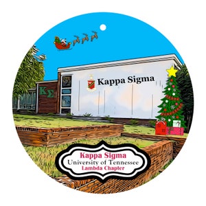 May include: Round Christmas ornament featuring a building with "Kappa Sigma" on it, a Christmas tree, and Santa in a sleigh. The ornament also has the text "Kappa Sigma University of Tennessee Lambda Chapter".