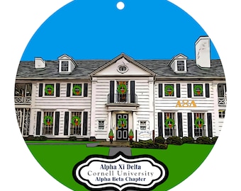 May include: Round ornament featuring a white house with green wreaths on the windows and a blue sky background. The text "Alpha Xi Delta Cornell University Alpha Beta Chapter" is displayed on the bottom.