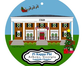 May include: A round Christmas ornament featuring a brown building with white columns and the Greek letters ΠΚΦ. Santa Claus in a sleigh pulled by reindeer flies above. The ornament includes the text "Pi Kappa Phi Athens, Georgia Lambda Chapter."