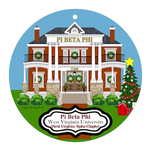 May include: A round Christmas ornament featuring a detailed illustration of a brick house with white columns and a black railing. The house has wreaths on the windows and a Christmas tree with gifts. The text "PI BETA PHI" is displayed above the house, and the text "Pi Beta Phi West Virginia University West Virginia Alpha Chapter" is below.