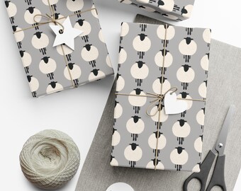 Papel de regalo navideño con estampado de ovejas, diseño a cuadros blancos y negros