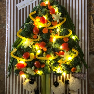 Light up your veggie tray.  String the lights throughout the broccoli Christmas tree.